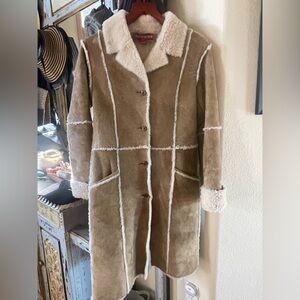 Sundance genuine leather/shearling coat. Size 4. Excellent condition.